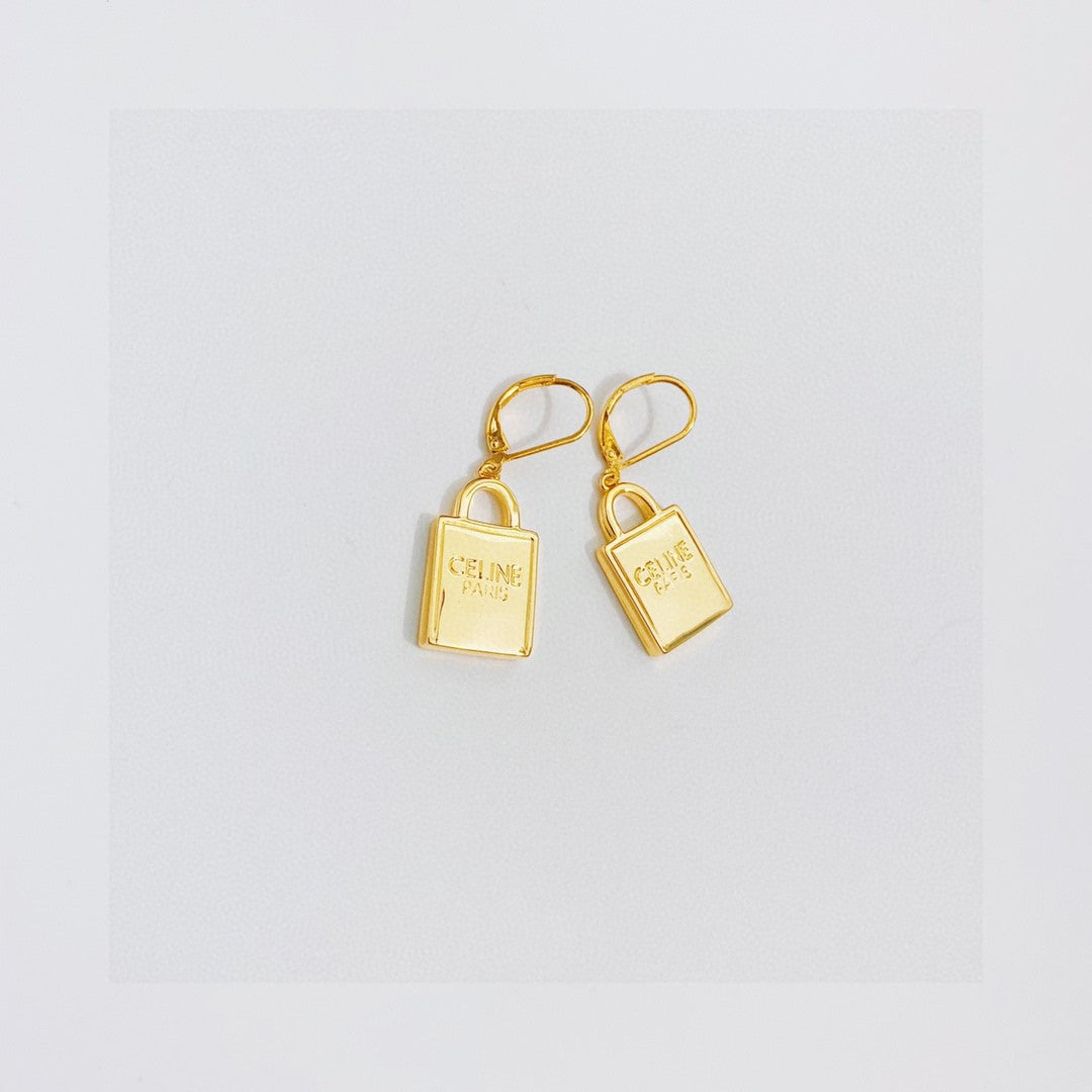 Signature Emblem Stud Earrings in Polished Metal-Tone – Design 01 styled detail