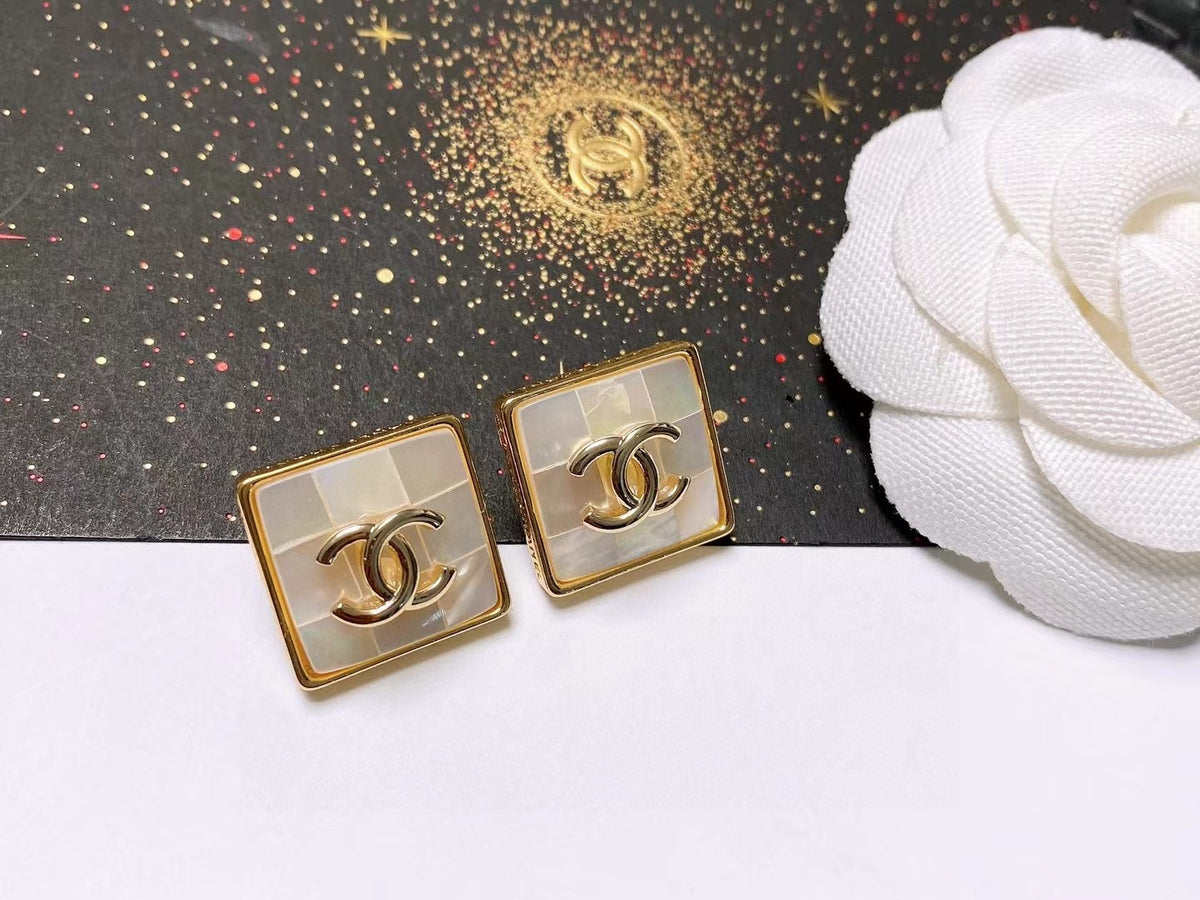 Signature Emblem Stud Earrings in Polished Metal-Tone – Design 012 styled product view