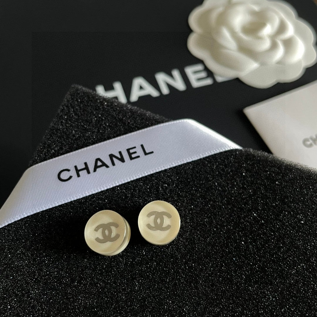 Double-C Emblem Stud Earrings in Polished Metal-Tone – Design 297 detail view