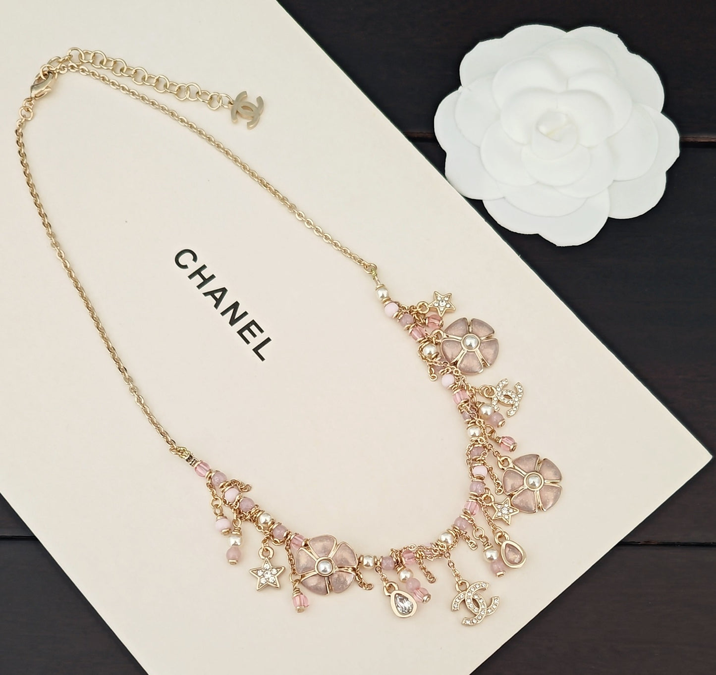 Signature Emblem Pendant Necklace in Gold-Tone – Pink Detail styled product view