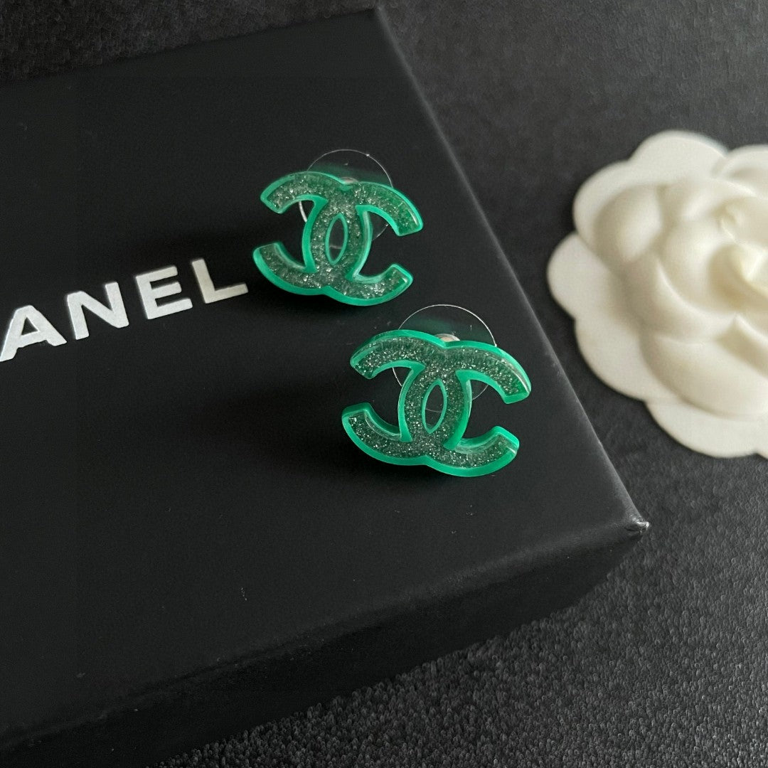 Double-C Emblem Stud Earrings in Polished Metal-Tone – Design 469 detail view