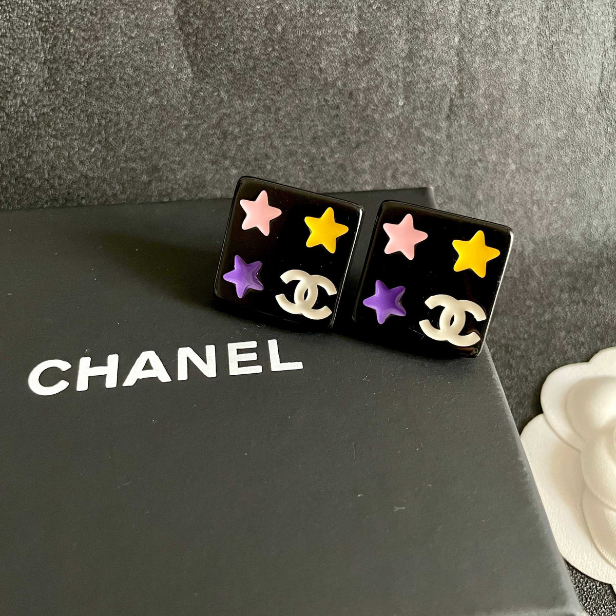 Double-C Emblem Stud Earrings in Polished Metal-Tone – Star Detail – Design 004 detail view