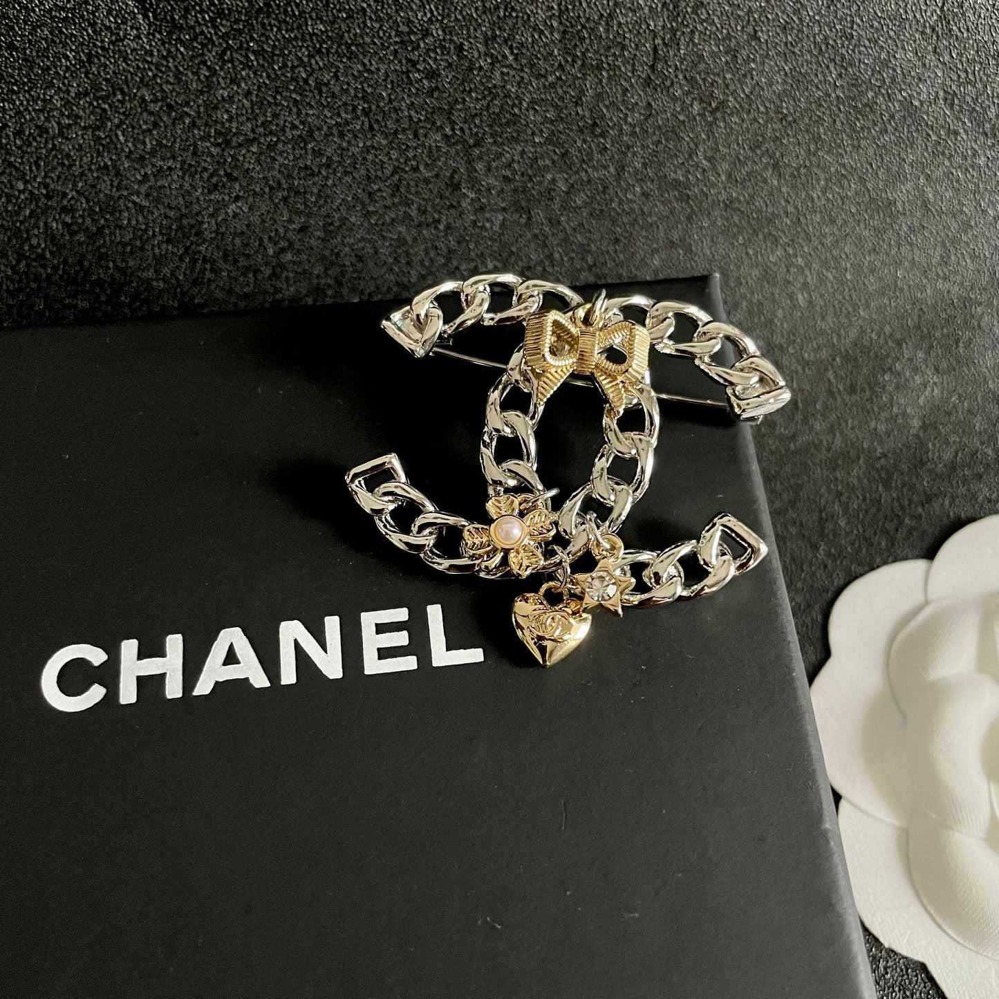 Signature Emblem Brooch in Polished Metal-Tone – Design 029 detail view