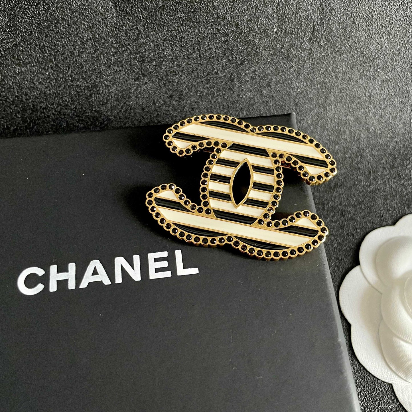Double-C Emblem Brooch in Polished Metal-Tone – Design 044 detail view