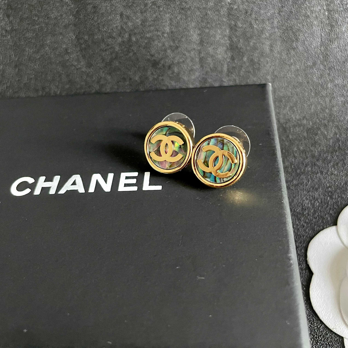 Double-C Emblem Stud Earrings in Polished Metal-Tone – Design 300 detail view