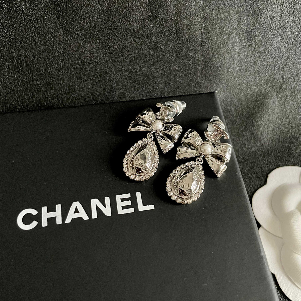 Signature Emblem Stud Earrings in Polished Metal-Tone – Design 118 detail view