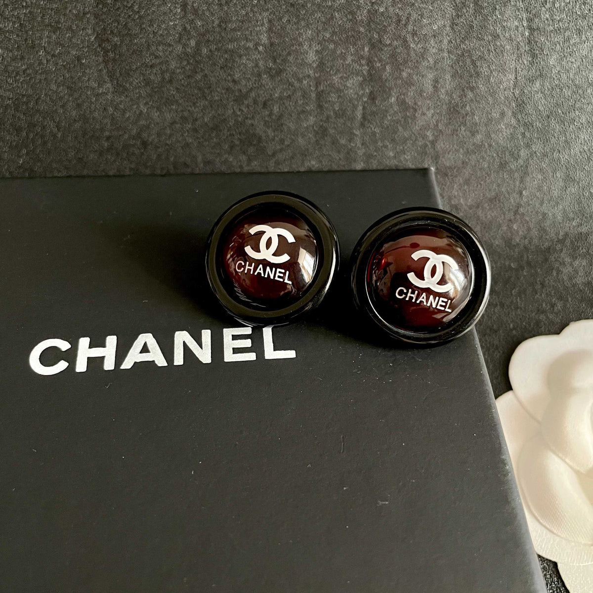 Double-C Emblem Stud Earrings in Polished Metal-Tone – Design 447 detail view