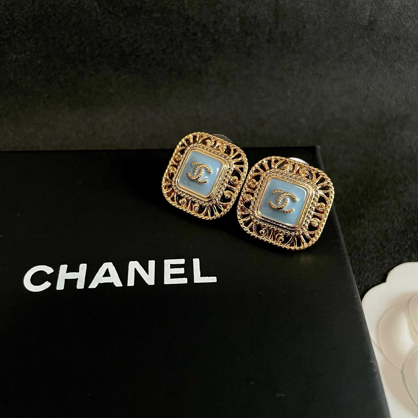 Double-C Emblem Stud Earrings in Polished Metal-Tone – Design 138 detail view