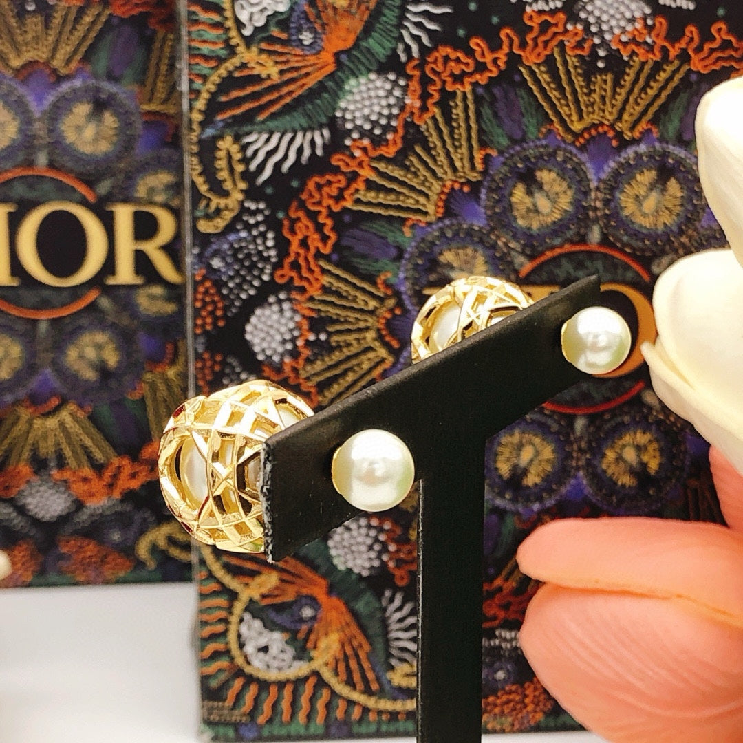 Sculptural Stud Earrings in Polished Metal-Tone with Openwork Detail front view