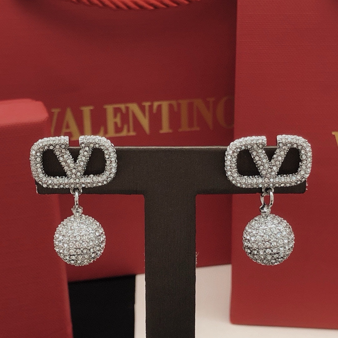 Signature Emblem Crystal-Accent Stud Earrings – Design 01 detail view