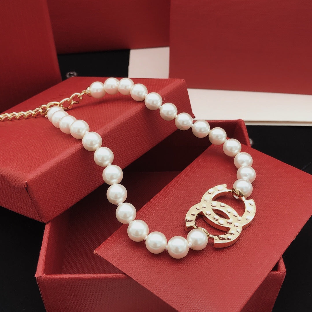 Double-C Emblem Pearl-Detail Pendant Necklace – Pearl Detail – Design 124 styled product view
