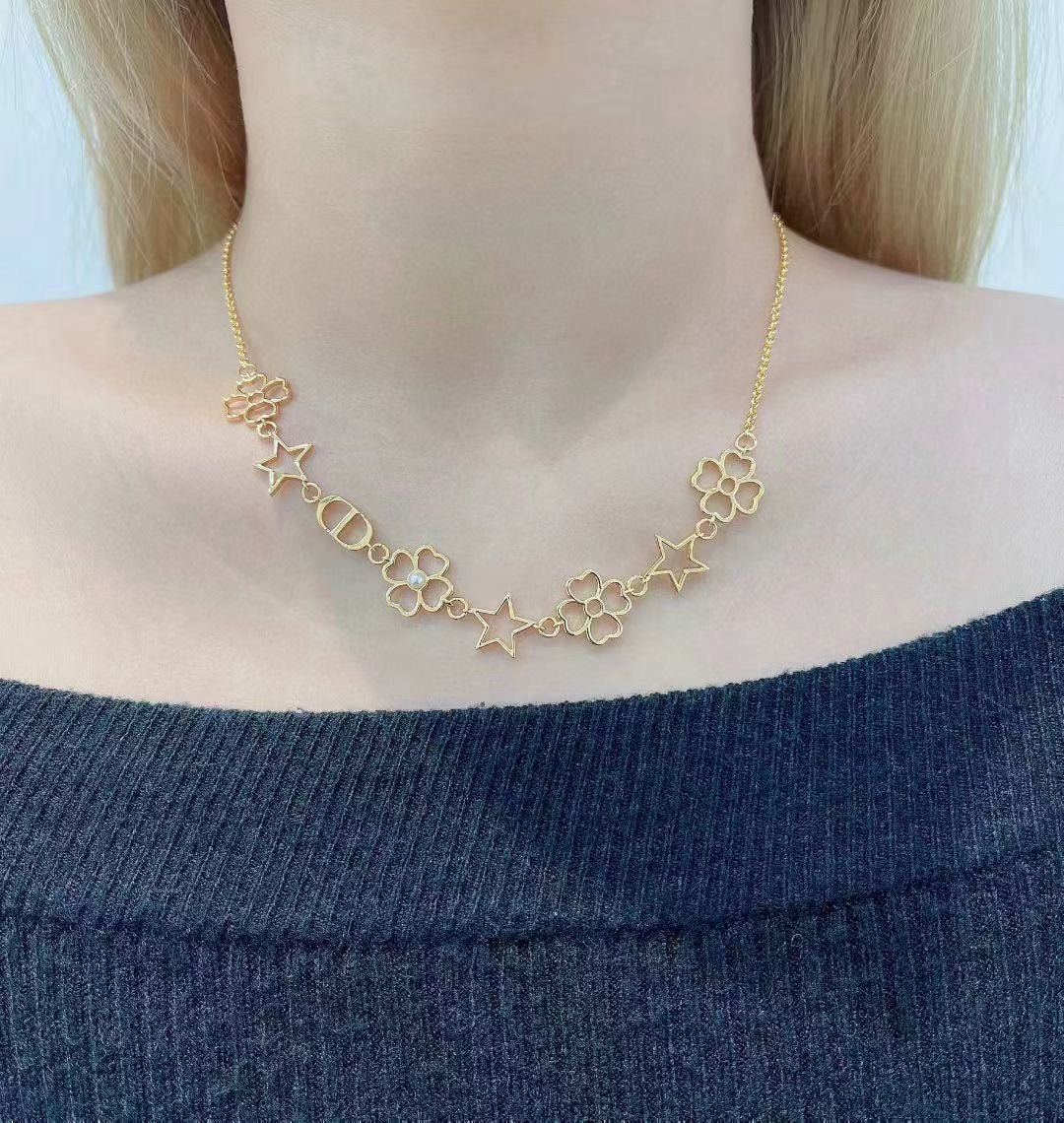 Star Motif Pendant Necklace in Polished Metal-Tone with Openwork Detail detail view