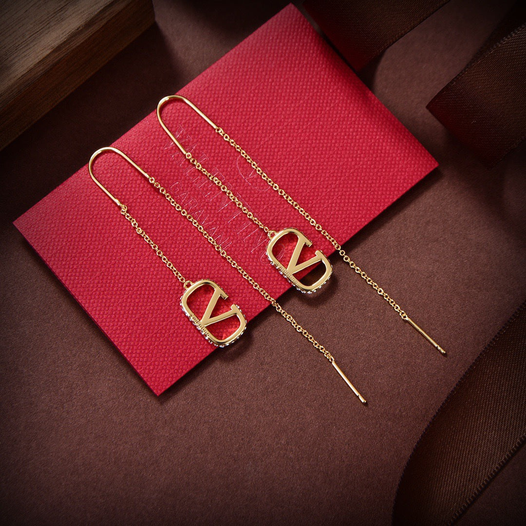 Signature Emblem Stud Earrings in Gold-Tone – Design 11 close-up view
