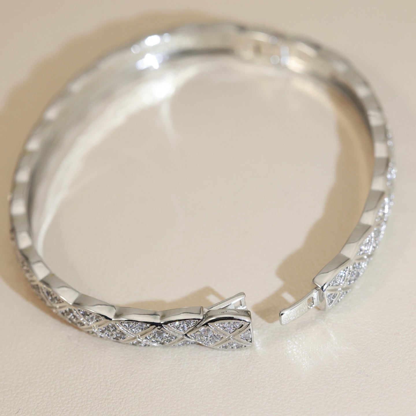 Double-C Emblem Bangle in Silver-Tone detail view