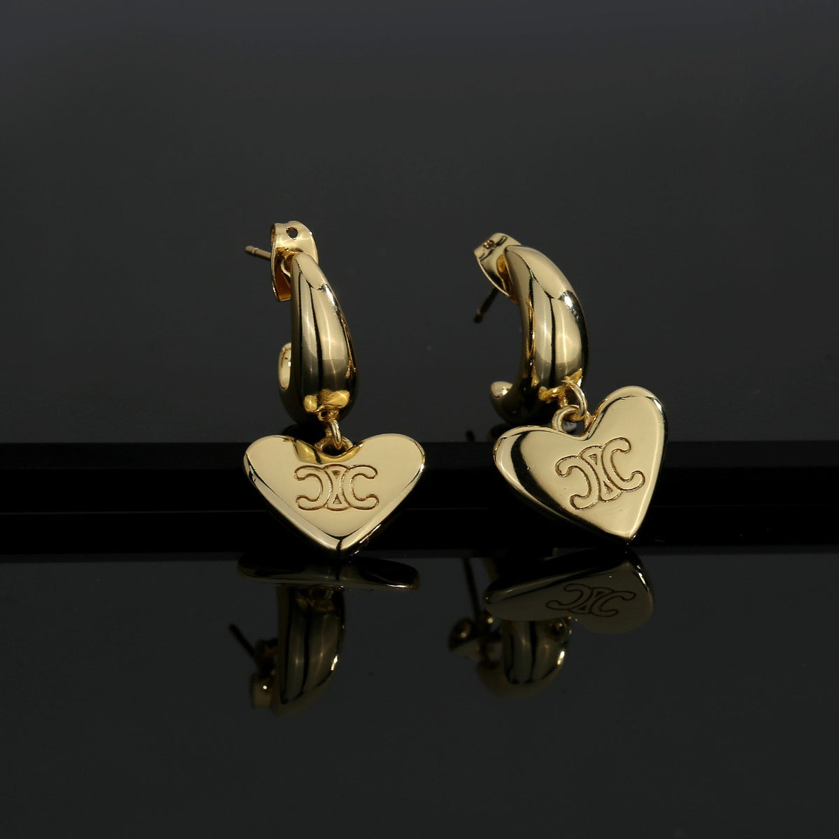Signature Emblem Stud Earrings in Gold-Tone – Design 02 styled detail