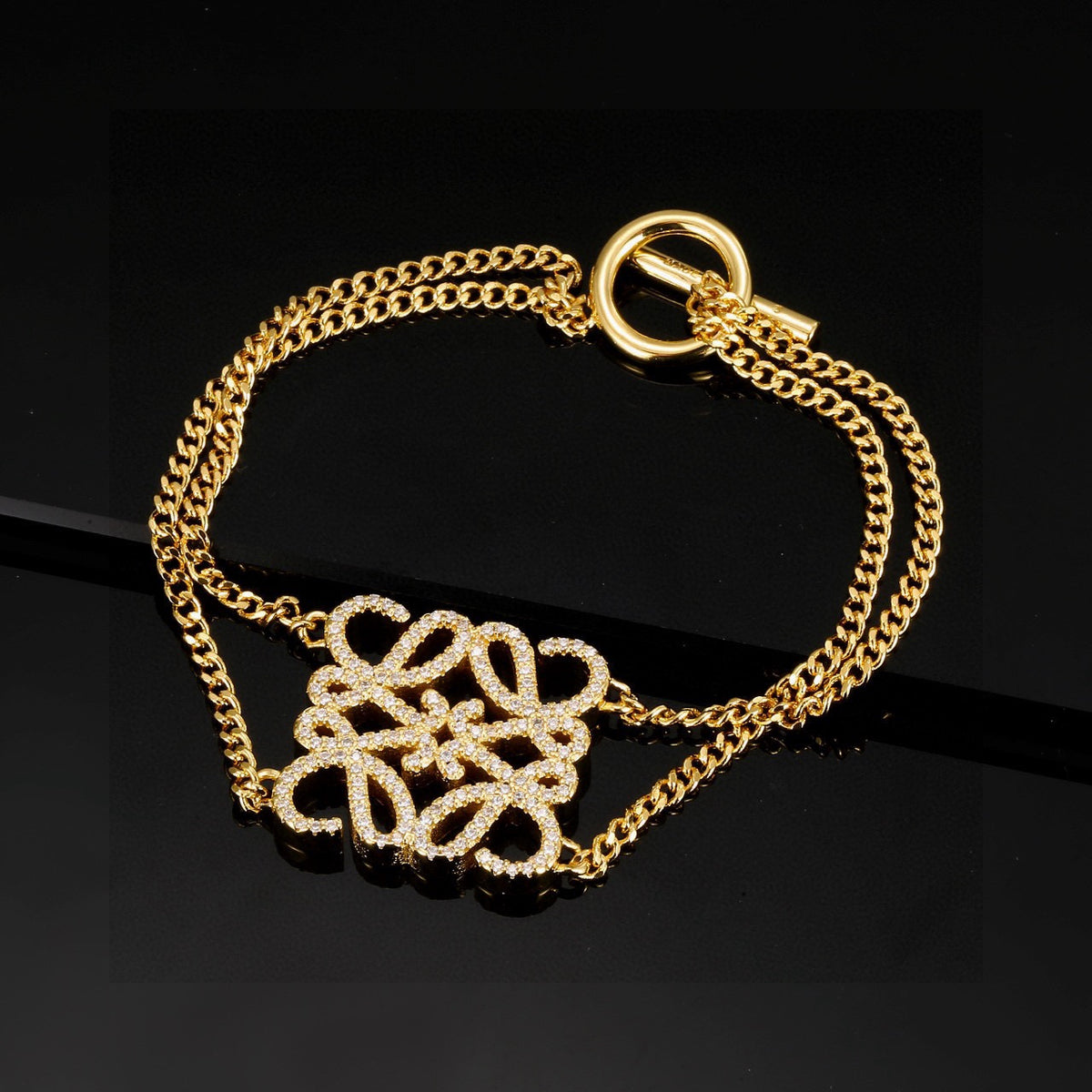 Floral Motif Statement Bracelet in Gold-Tone with Crystal-Style Accents close-up detail