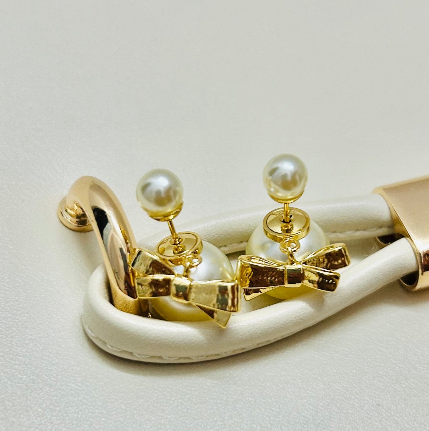 Bow & Butterfly Motif Stud Earrings in Polished Metal-Tone – Design 004 close-up detail