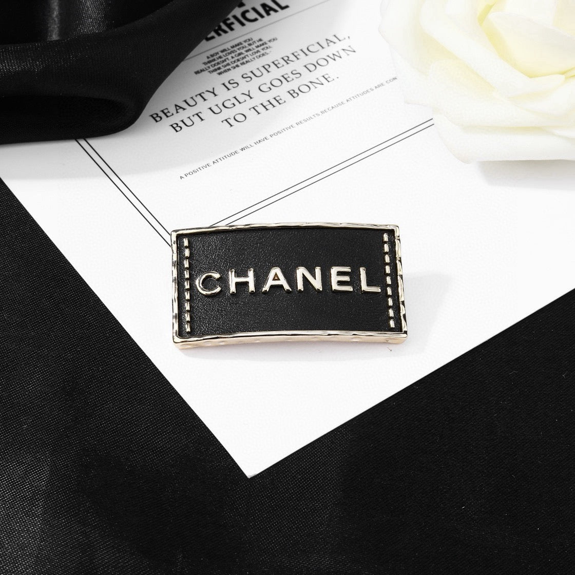 Double-C Emblem Brooch in Polished Metal-Tone – Design 026 detail view