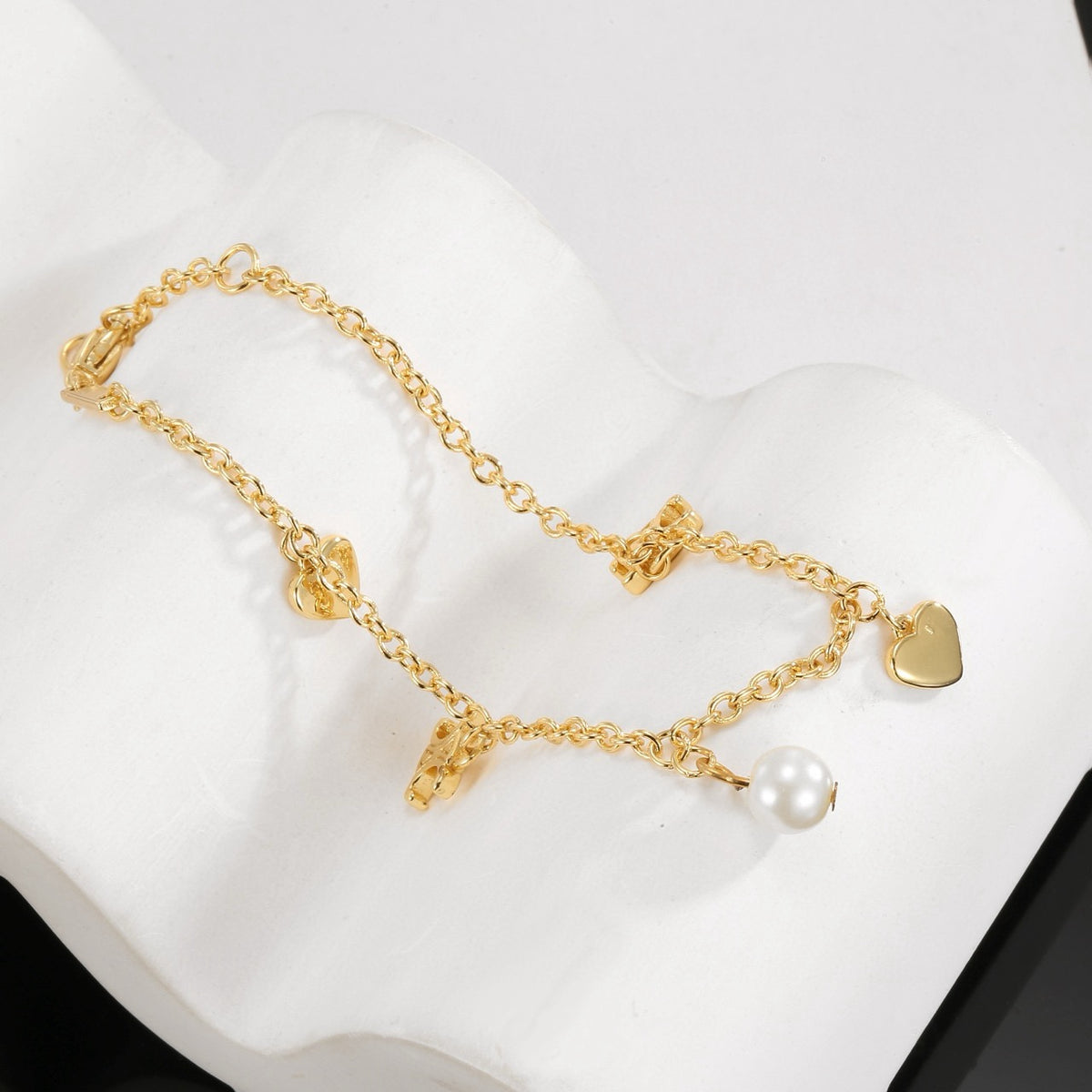 Triomphe-Inspired Emblem Bracelet in Gold-Tone – Red – Design 02 front view