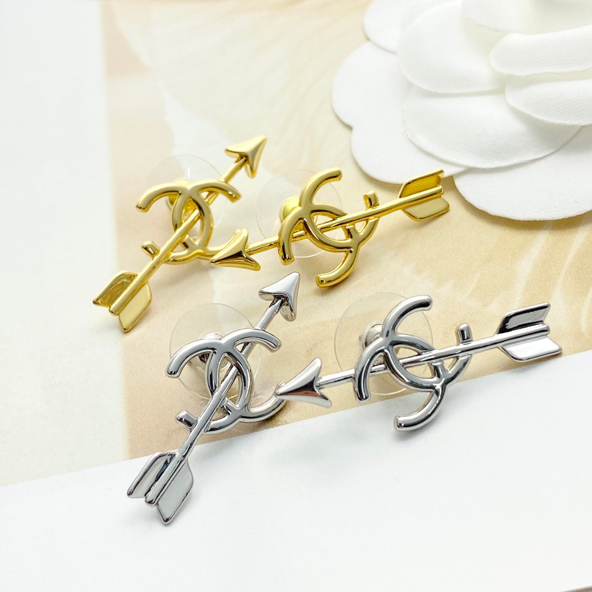 Double-C Emblem Stud Earrings in Gold-Tone – Design 027 detail view