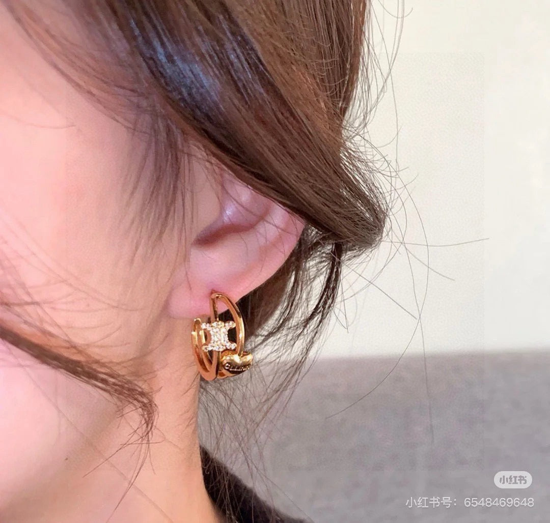 Triomphe-Inspired Emblem Stud Earrings in Polished Metal-Tone – Design 03 front view