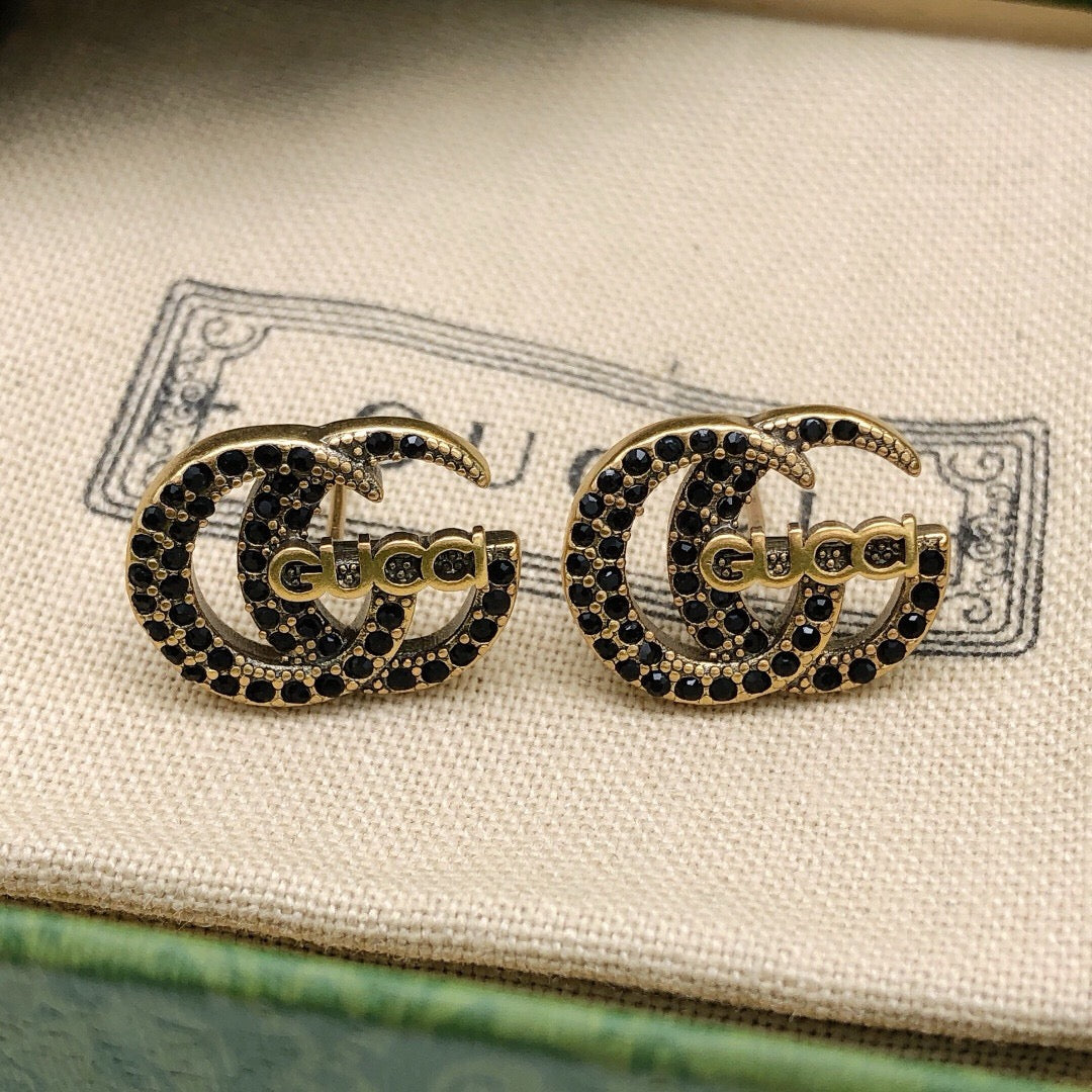 Double-G Emblem Stud Earrings in Polished Metal-Tone – Design 003 styled product view