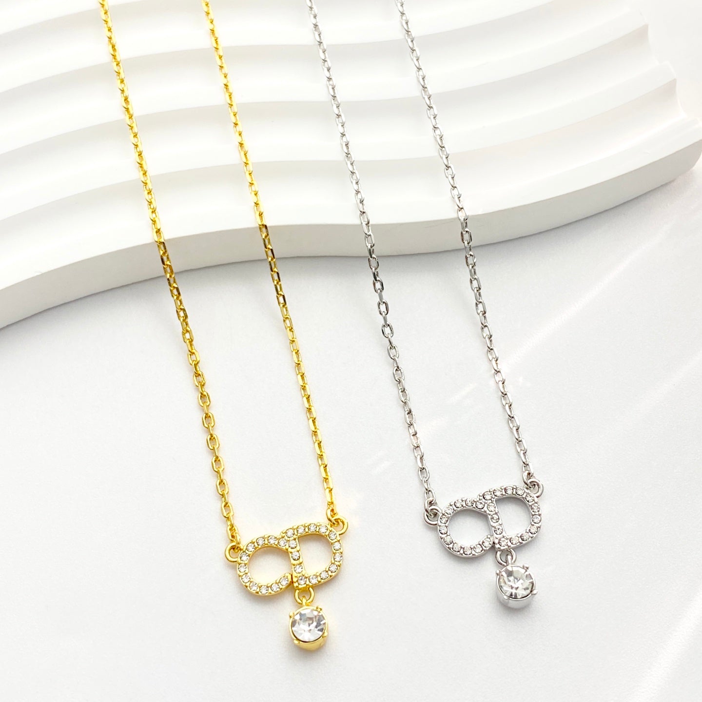 Graphic Letter Motif Pendant Necklace in Gold-Tone with Crystal-Style Accents – Design 004 front view