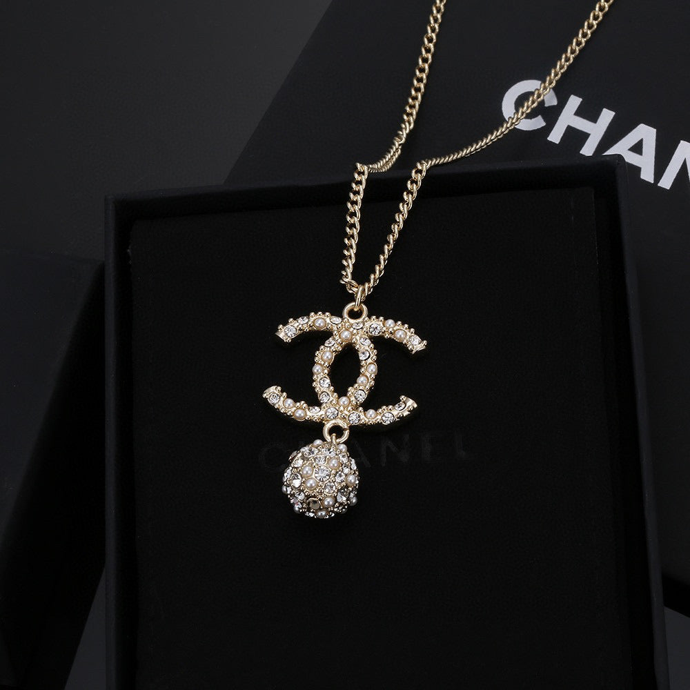Double-C Emblem Pearl-Detail Pendant Necklace – Pearl Detail – Design 009 main product view