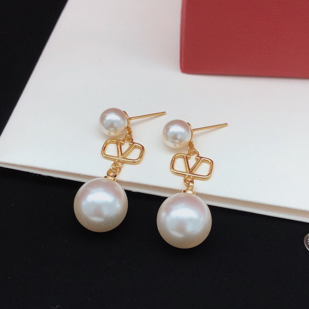 Signature Emblem Stud Earrings in Gold-Tone – Design 07 styled detail