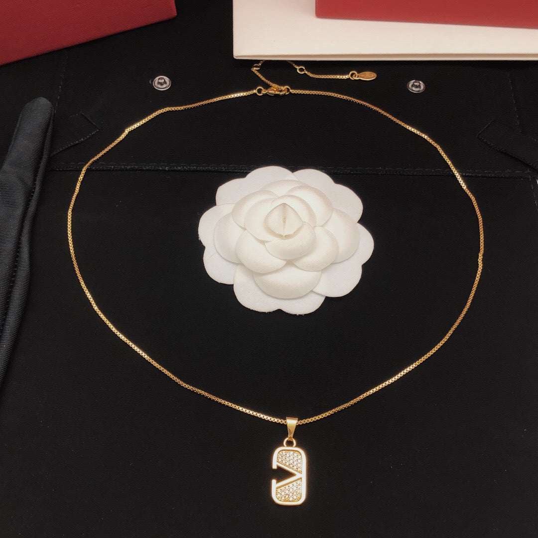 Signature Emblem Crystal-Accent Pendant Necklace – Design 06 styled detail