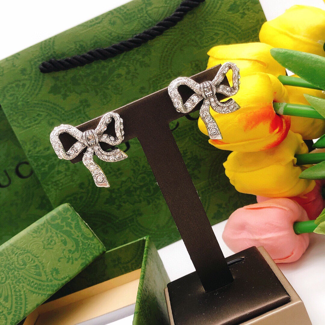 Bow Crystal-Accent Stud Earrings styled product view