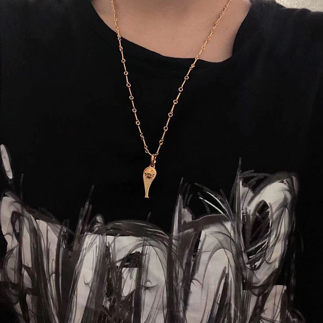 Floral Cross Whistle Pendant Necklace styled product view
