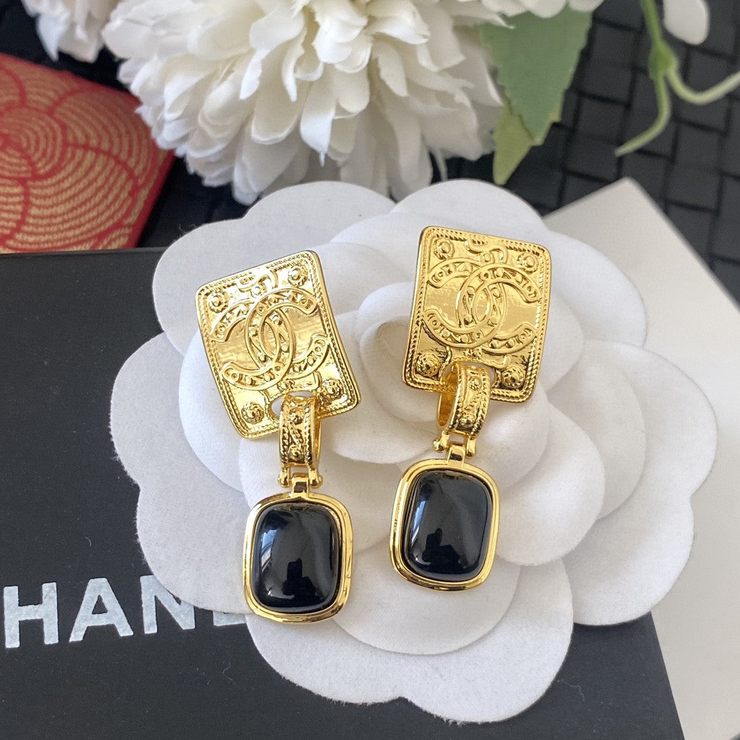 Letter Stud Earrings in Silver-Tone – Black Detail detail view