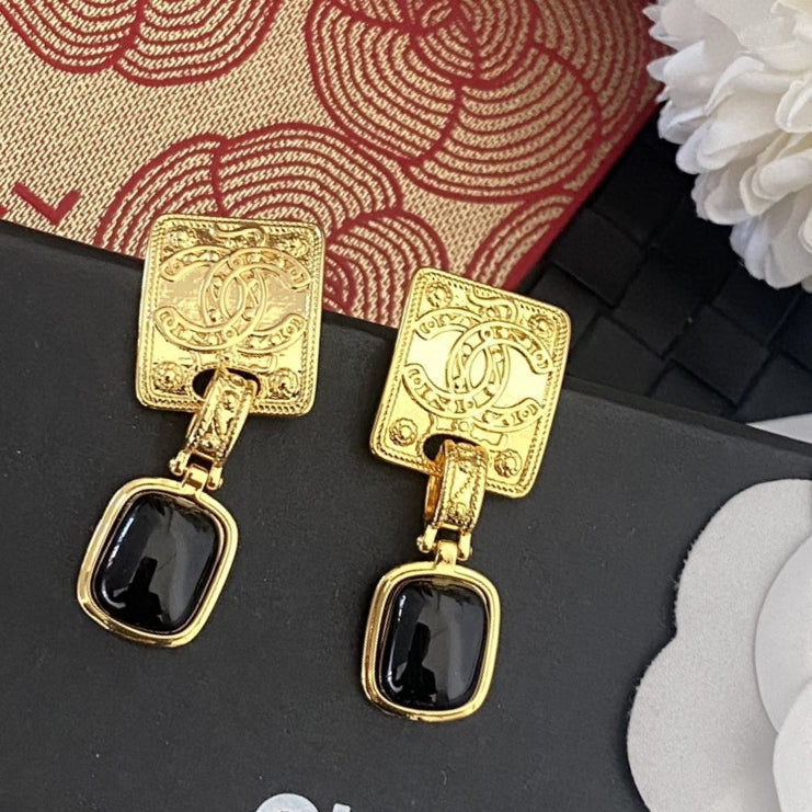 Letter Stud Earrings in Silver-Tone – Black Detail main product view