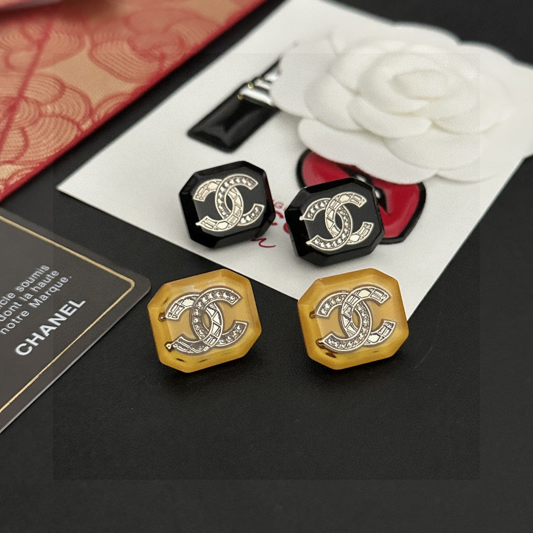 Double-C Emblem Stud Earrings in Polished Metal-Tone – Design 462 styled product view