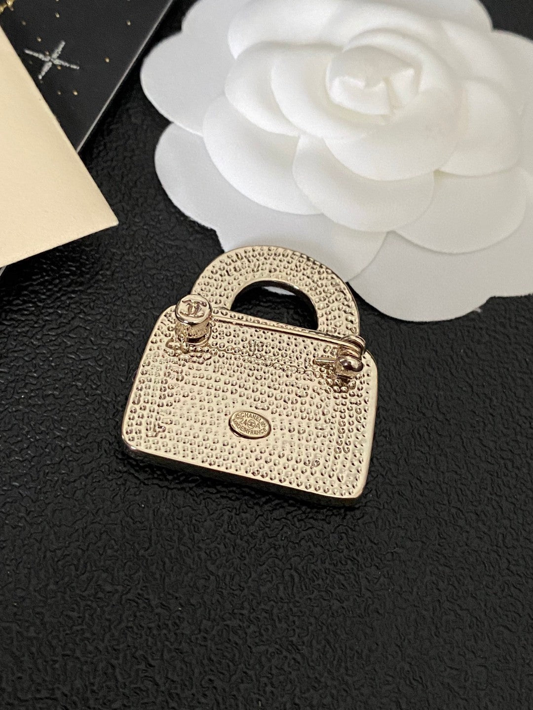 Signature Emblem Brooch in Polished Metal-Tone – Design 002 close-up detail