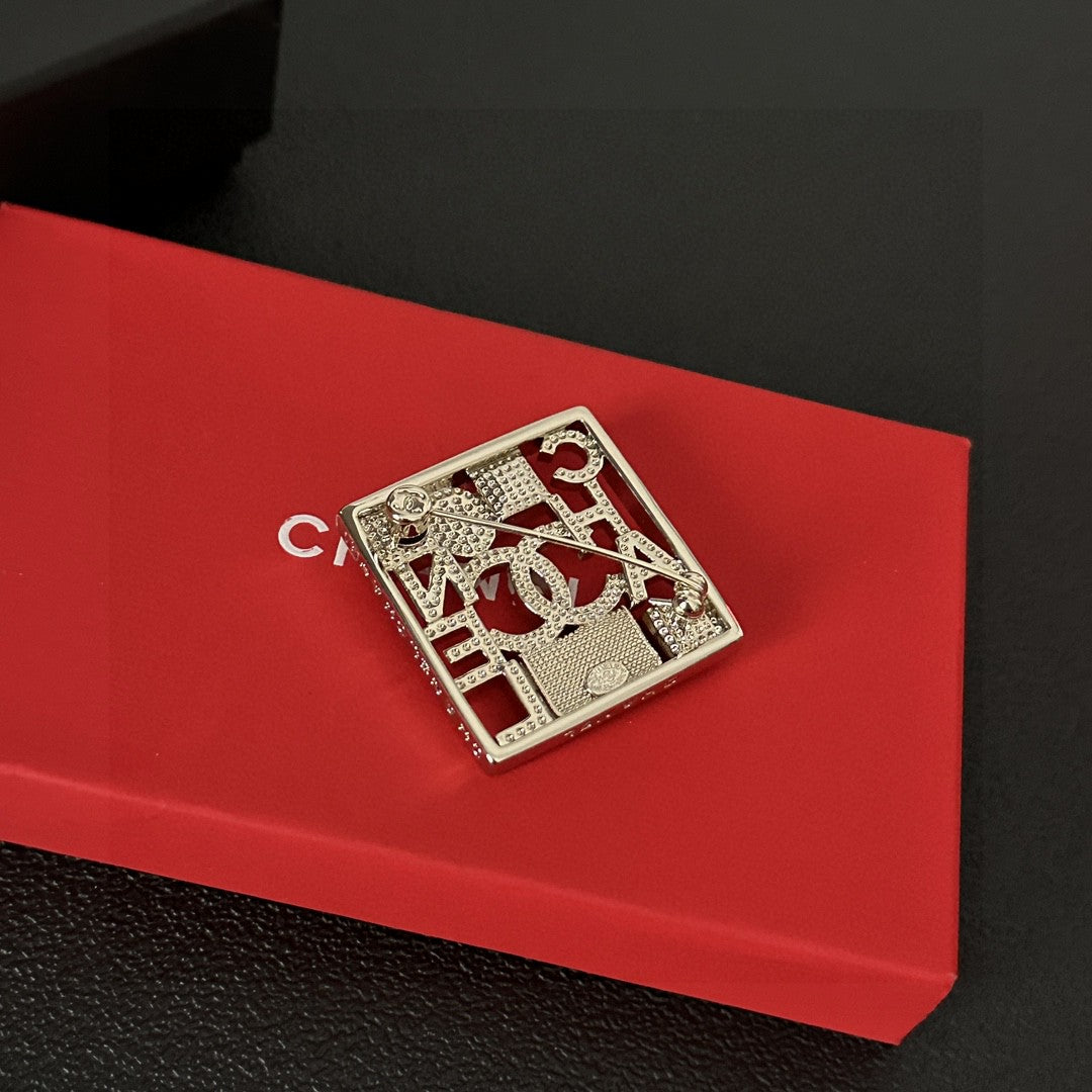 Signature Emblem Brooch in Polished Metal-Tone – Design 003 main product view
