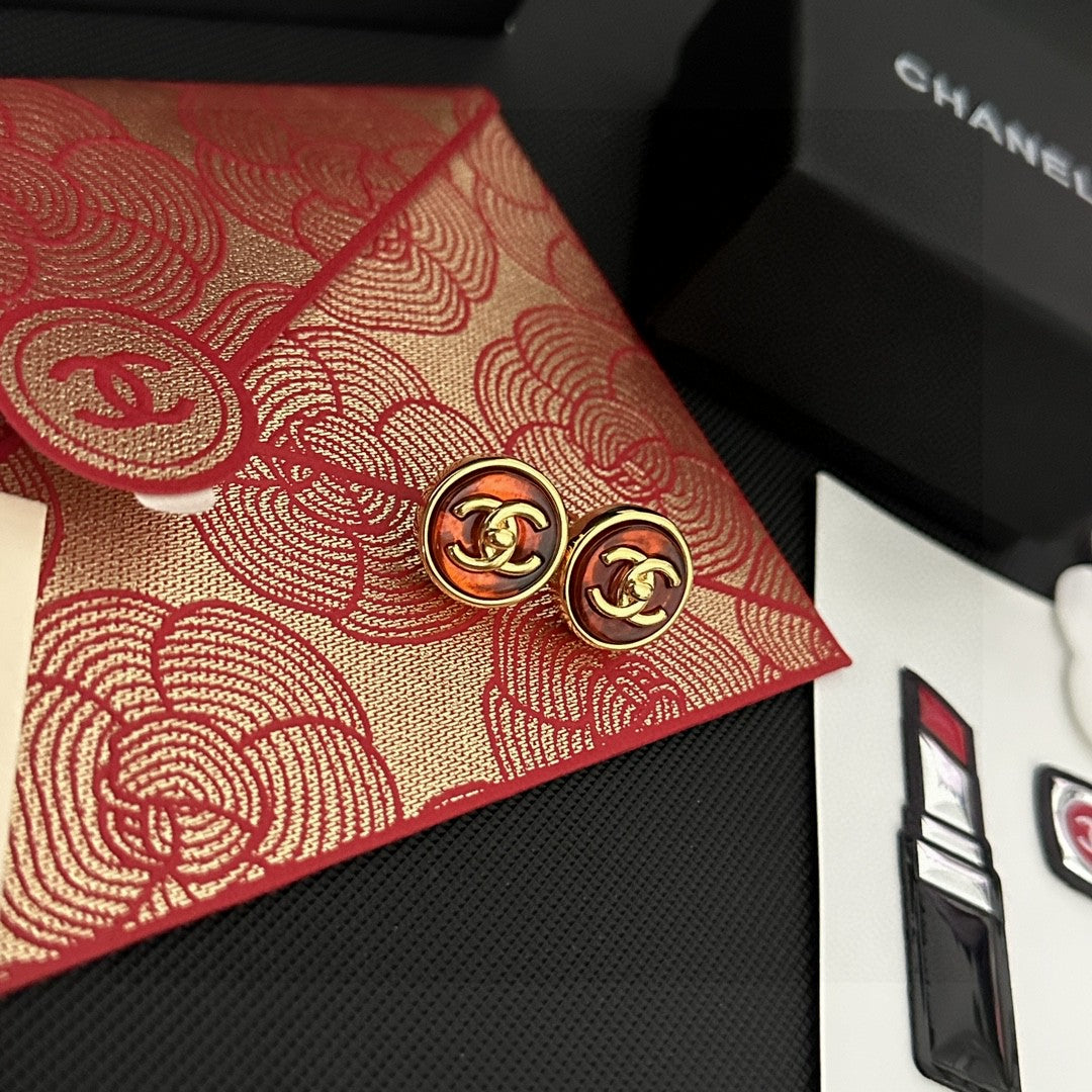 Double-C Emblem Stud Earrings in Polished Metal-Tone – Design 109 detail view