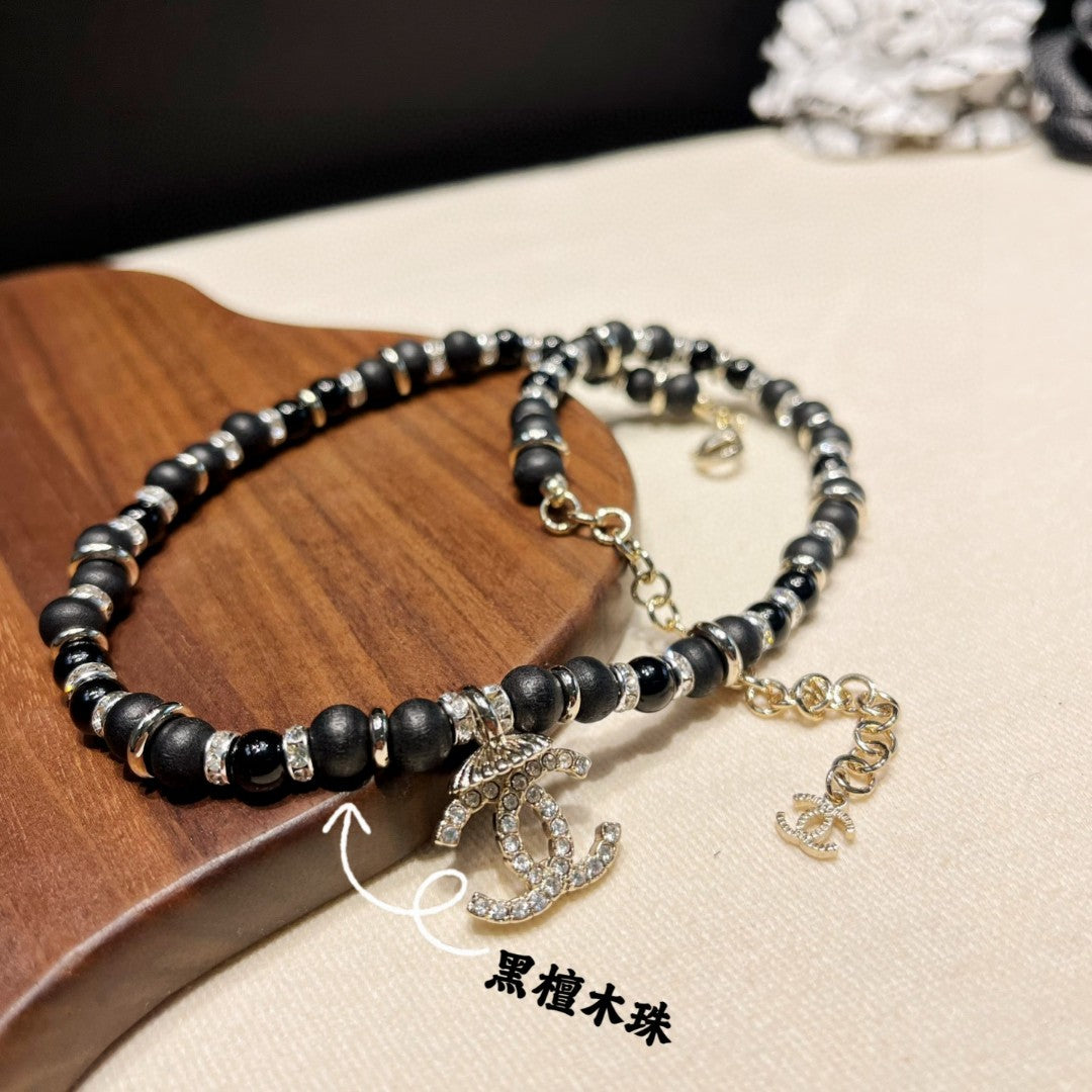 Signature Emblem Pendant Necklace in Polished Metal-Tone – Black Detail – Design 003 main product view