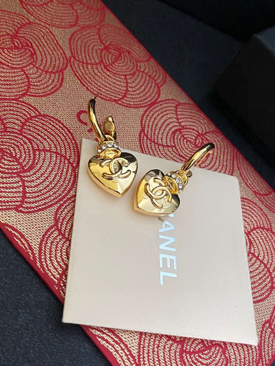 Double-C Emblem Stud Earrings in Polished Metal-Tone – Design 407 detail view