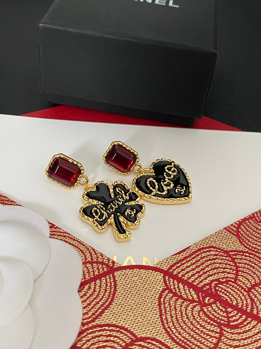Double-C Emblem Stud Earrings in Polished Metal-Tone – Design 404 front product view