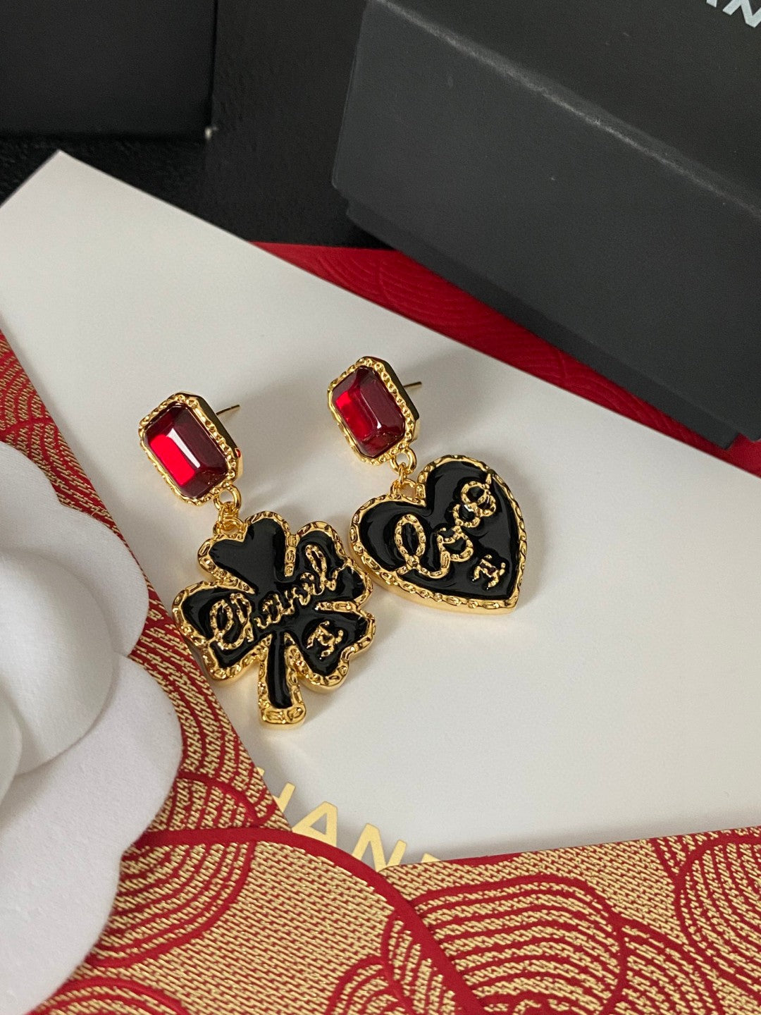 Double-C Emblem Stud Earrings in Polished Metal-Tone – Design 404 detail view