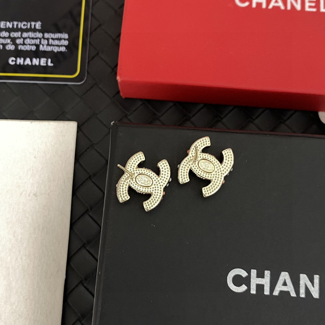 Double-C Emblem Stud Earrings in Polished Metal-Tone – Design 403 close-up detail