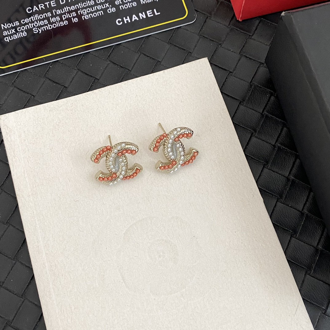 Double-C Emblem Stud Earrings in Polished Metal-Tone – Design 403 styled product view