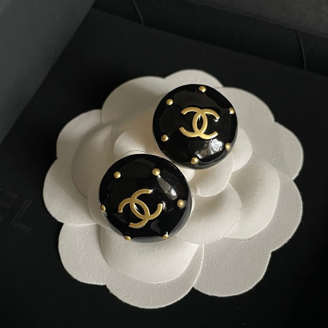 Double-C Emblem Stud Earrings in Polished Metal-Tone – Design 402 main product view