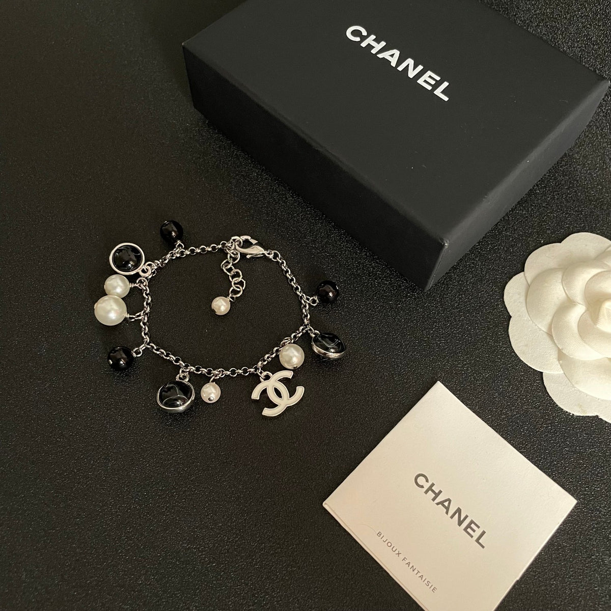 Signature Emblem Bracelet in Polished Metal-Tone – Black Detail – Design 003 close-up detail