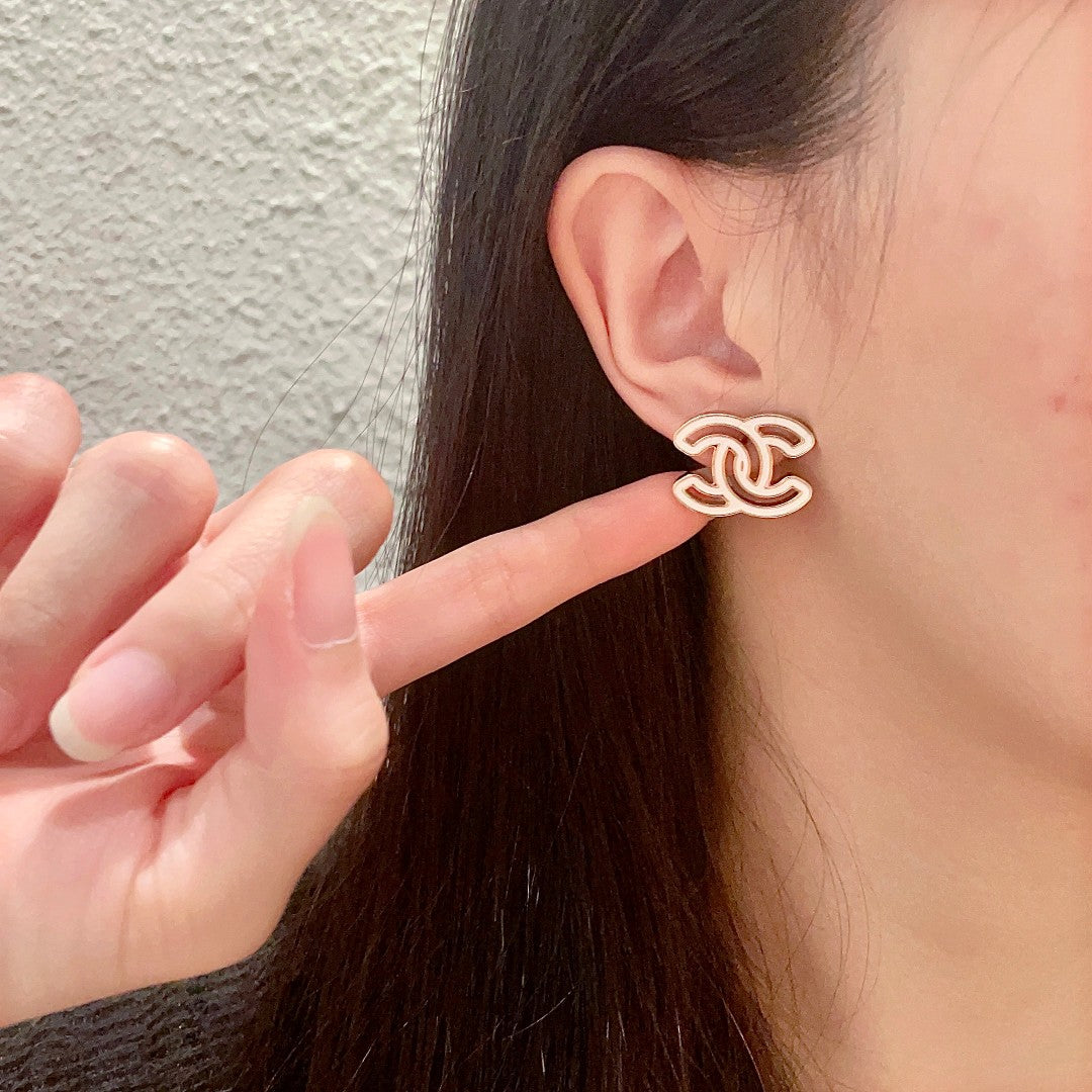 Double-C Emblem Stud Earrings in Polished Metal-Tone – Design 377 front product view