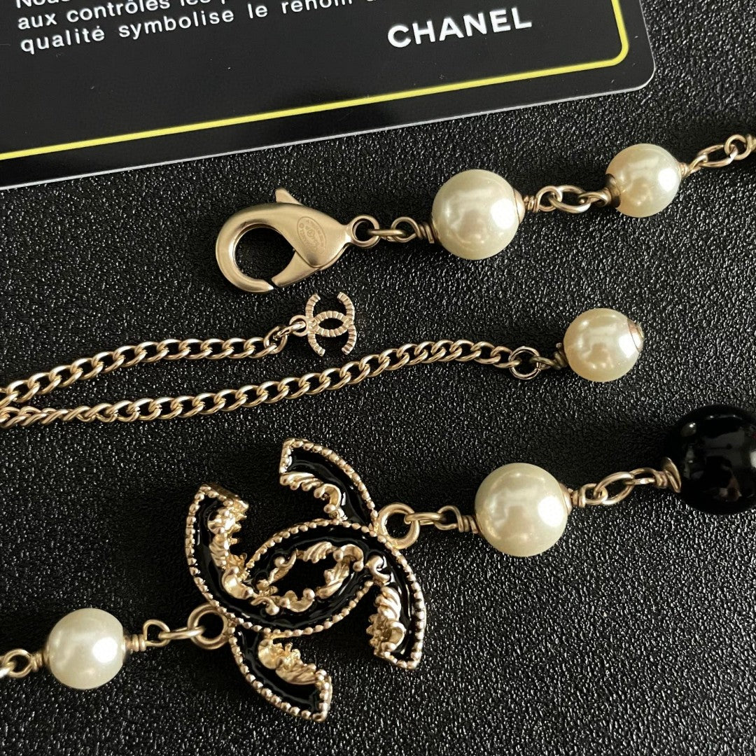 Double-C Emblem Pearl-Detail Pendant Necklace – Pearl Detail – Design 117 close-up detail