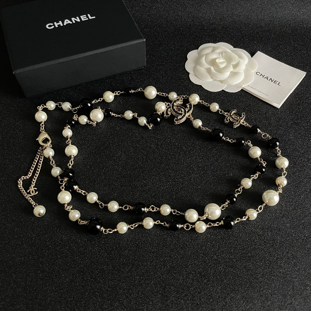 Double-C Emblem Pearl-Detail Pendant Necklace – Pearl Detail – Design 117 detail view