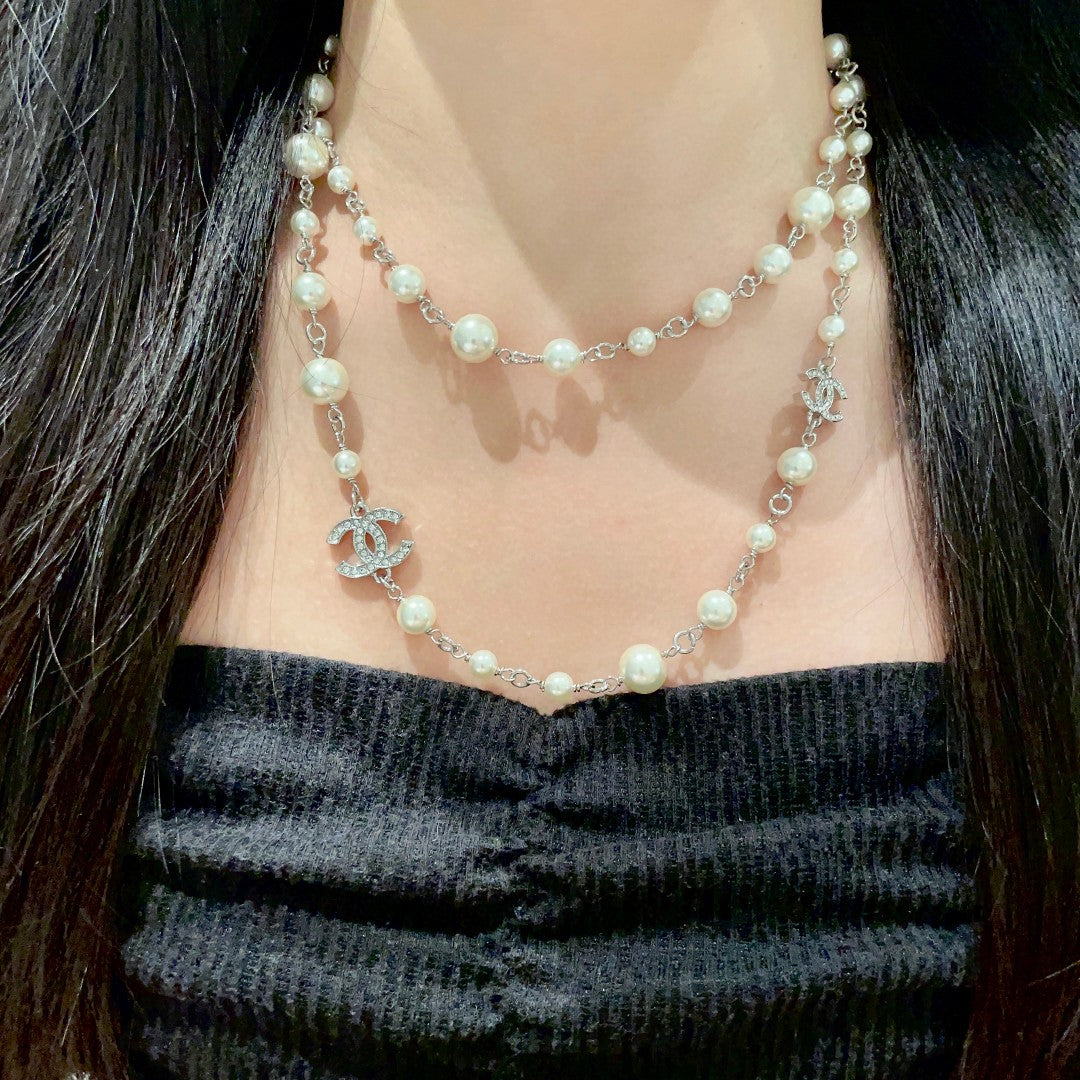 Double-C Emblem Pearl-Detail Pendant Necklace – Pearl Detail – Design 115 detail view
